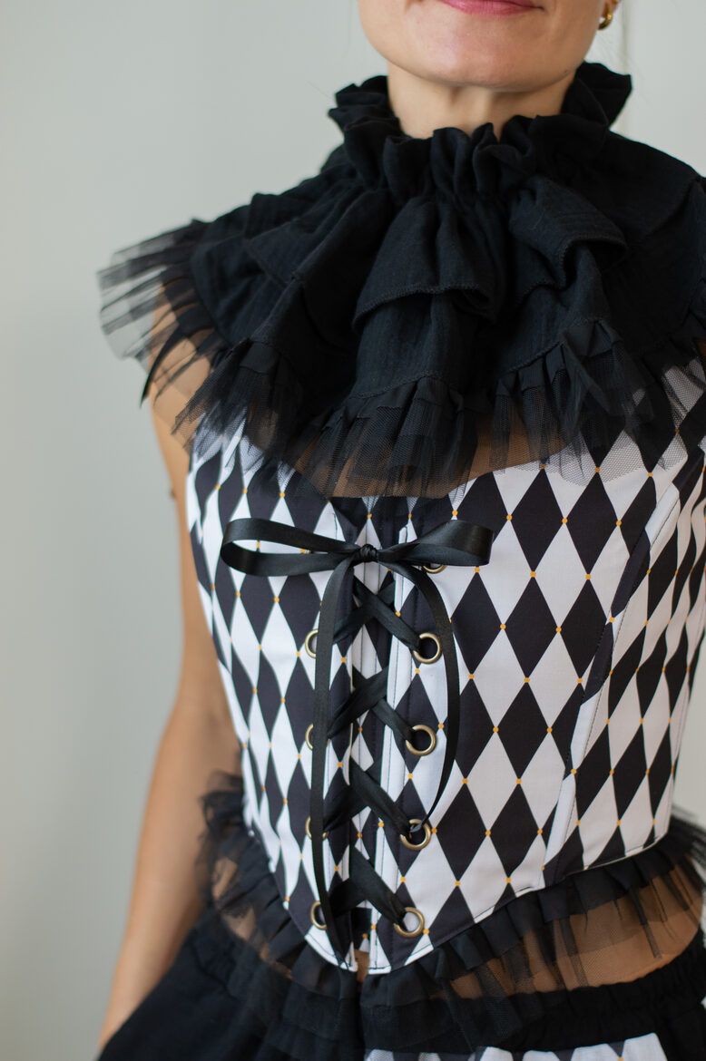 Black and white harlequin corset