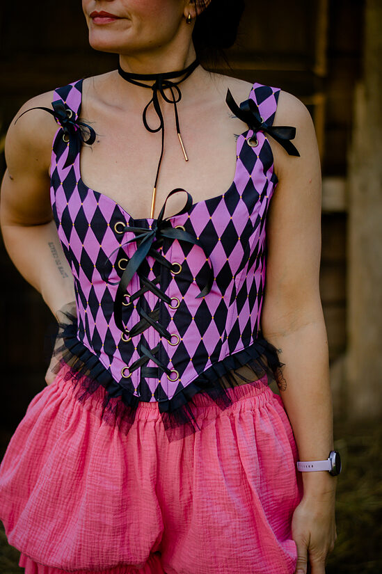 Purple and black harlequin corset