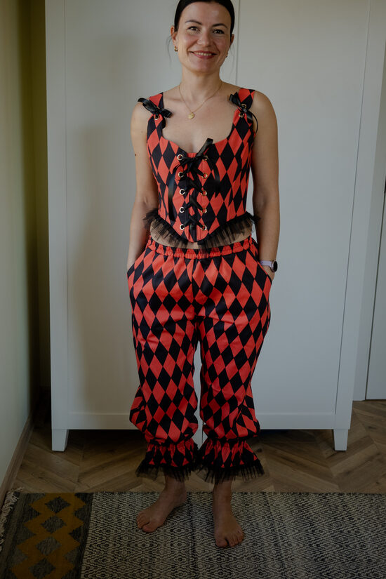 Red and black harlequin pants
