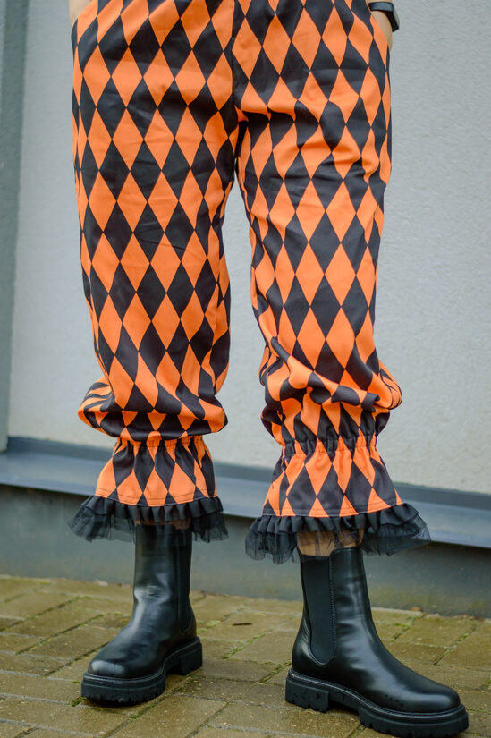 Orange and black harlequin pants
