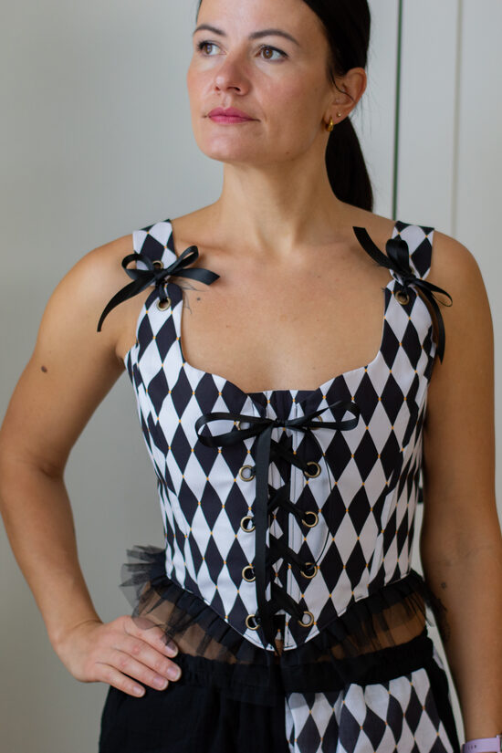 Black and white harlequin corset|black trim