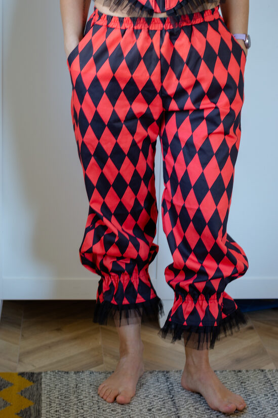 Black and red harlequin pants size M
