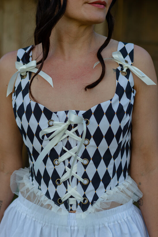 Black and white harlequin corset|white trim